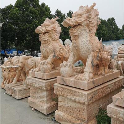 金貔貅-河北曲阳石麒麟厂家定做大型晚霞红石雕麒麟门口一对石材雕刻